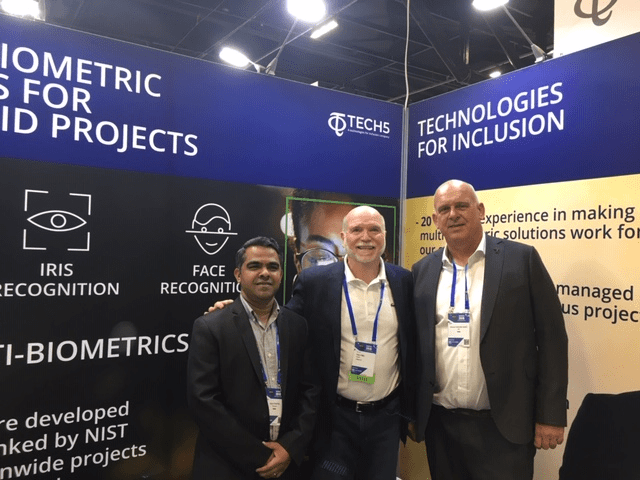 The Tech5 booth at ID4Africa 2019. From left to right: Rahul Parthe, Founder & Chairman, Tech5; Peter O'Neill, President, FindBiometrics; Machiel van der Harst, Founder & CEO, Tech5.
